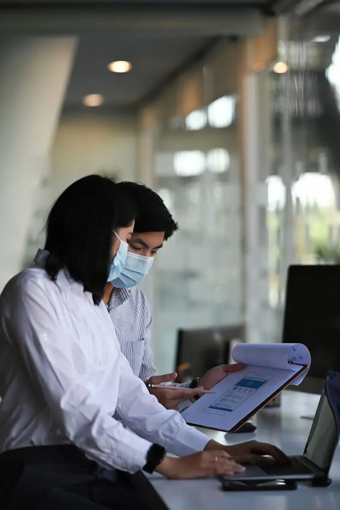 Team looking at camera in office
